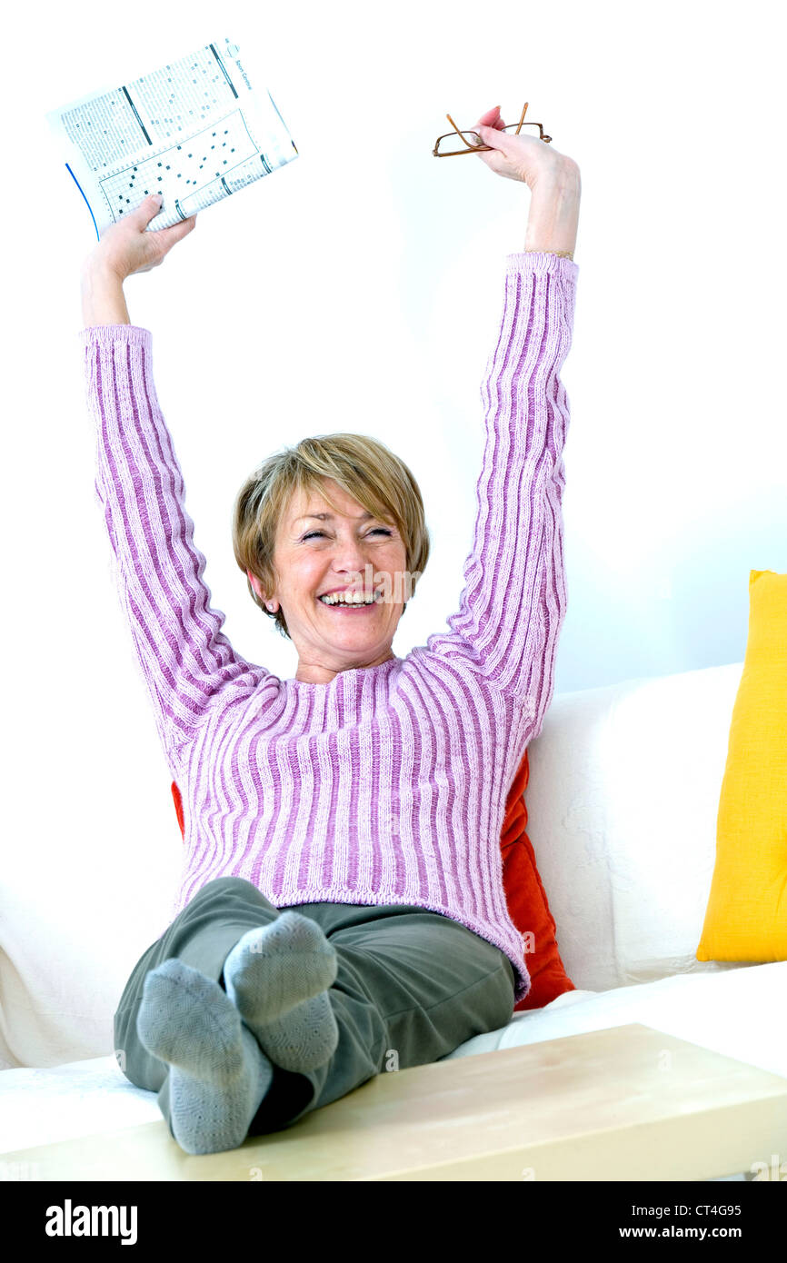 Persona anziana e stretching Foto Stock