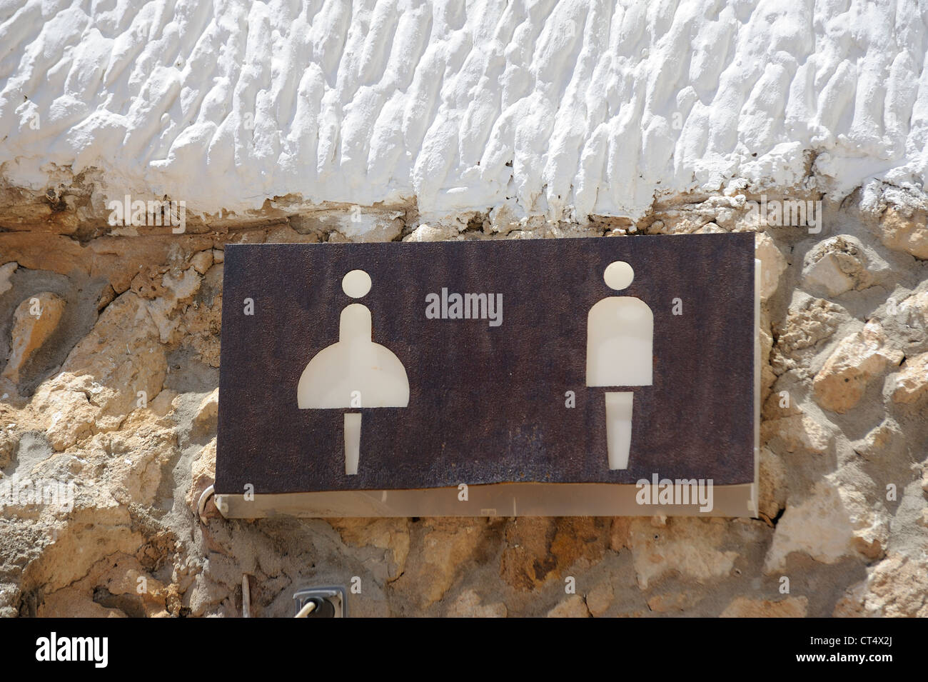 Maschio e femmina segni toilette Minorca isole Baleari Spagna Foto Stock