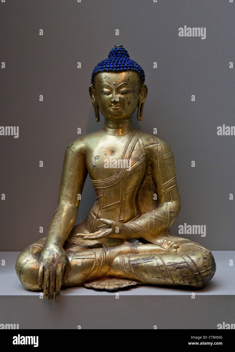Buddha seduto scultura - Gilt-rame, nel Tibet Centrale, xiv secolo Foto Stock