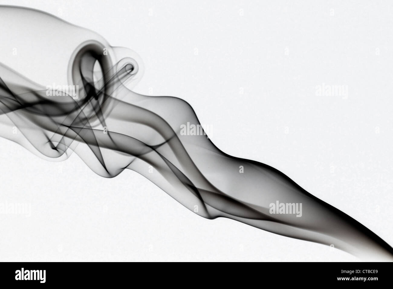 Abstract di curling di fumo e la creazione di forme belle Foto Stock
