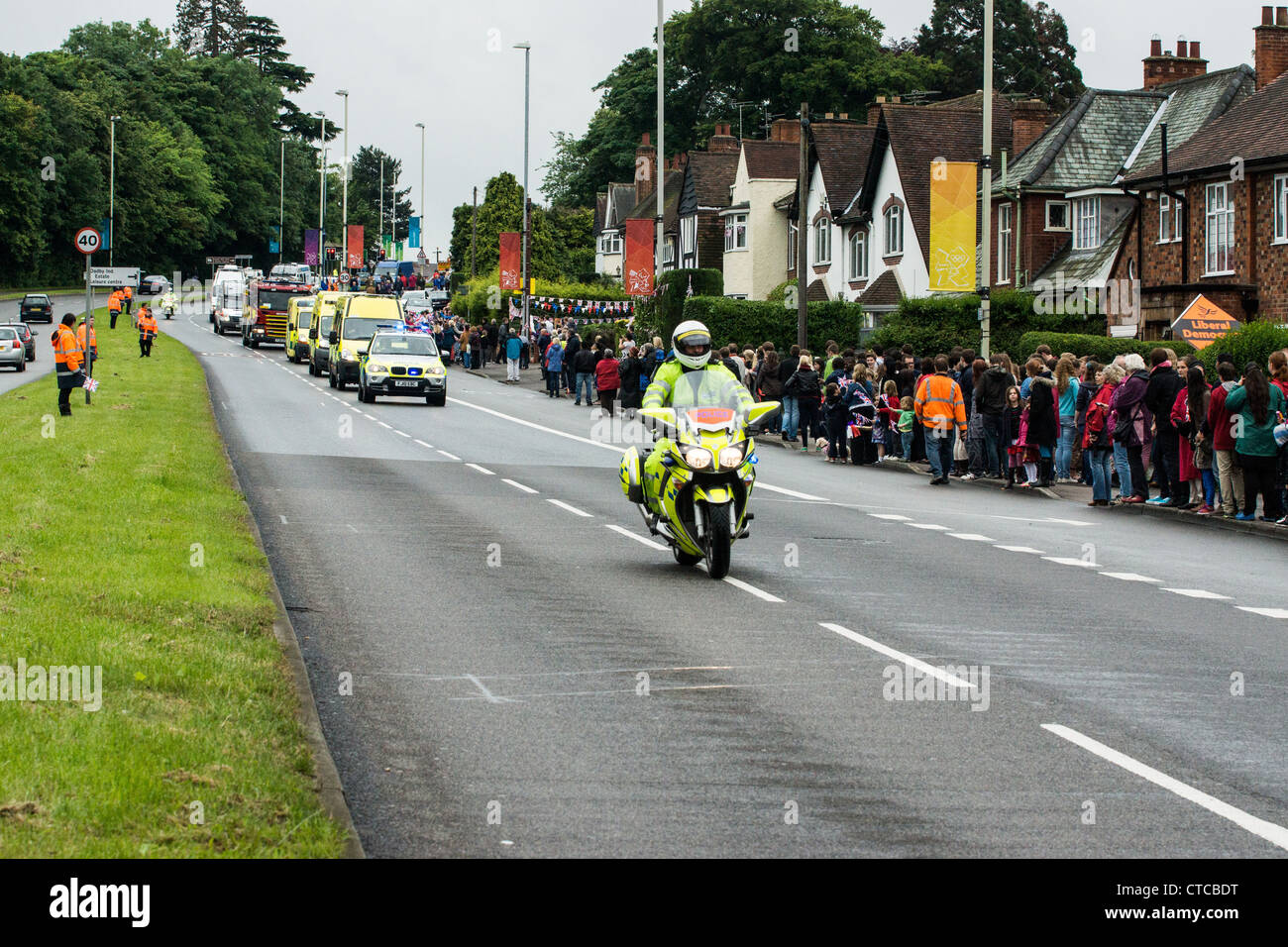 Moto della polizia escort del relè olimpico, A6,Oadby, Leicester Foto Stock