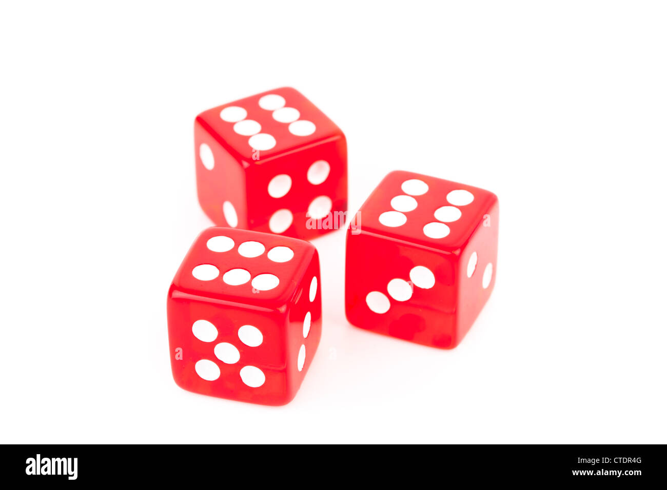 Tre dadi rossi Foto Stock