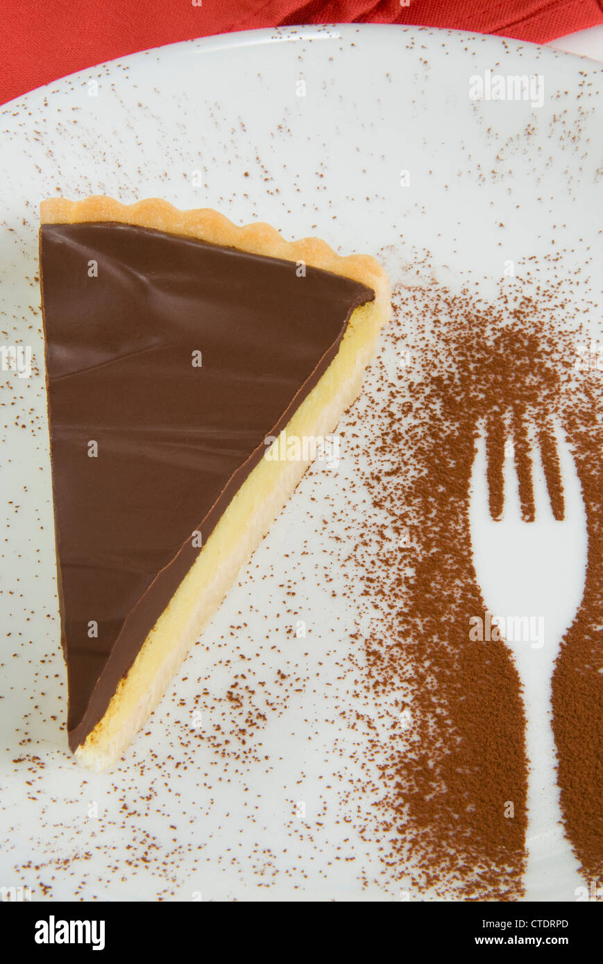 Fetta di semola e torta al cioccolato fondente Foto Stock