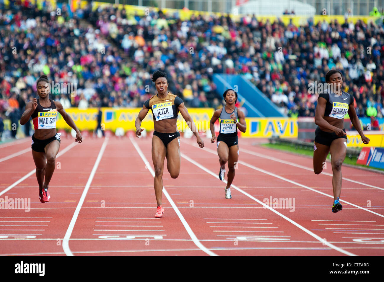 Carmelita JETER, Tianna MADISON, Benedizione OKAGBARE, W 100m Finale, Donne 100m Finale, AVIVA London atletica Grand Prix Foto Stock