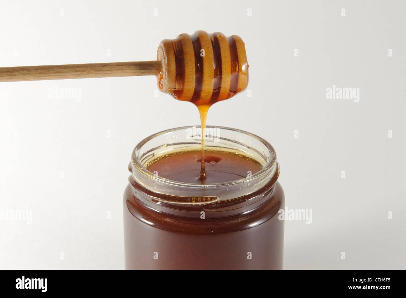Miele di gocciolamento del bilanciere takano cuore wamitsu miele in barattolo, Tokyo, Giappone Foto Stock