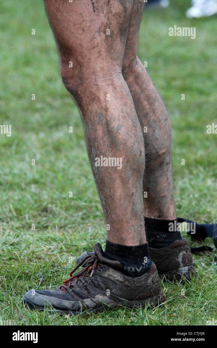 Terreni fangosi fell running gambe Foto Stock