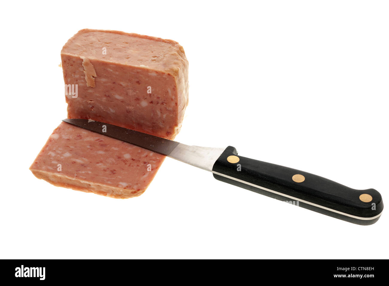 Pranzo di carne tagliata a fette con un coltello Foto Stock