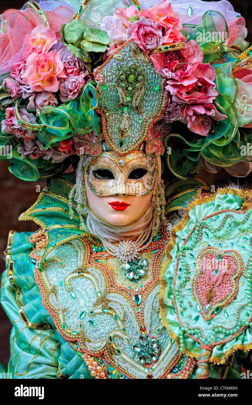 Partecipante mascherata durante il Carnevale nel Quartiere Arsenale di Venezia Foto Stock