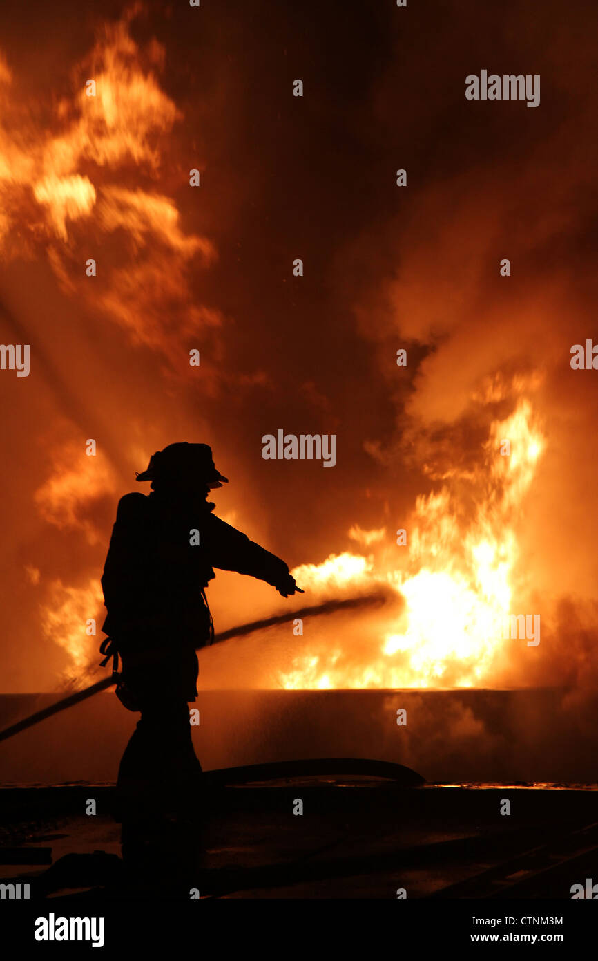 Vigile del fuoco a extra o più allarmi incendio, e Stati Uniti d'America Foto Stock