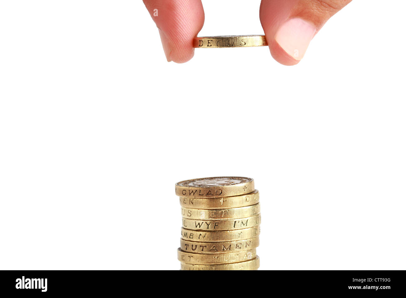 Crescere coin pila uno per uno Foto Stock
