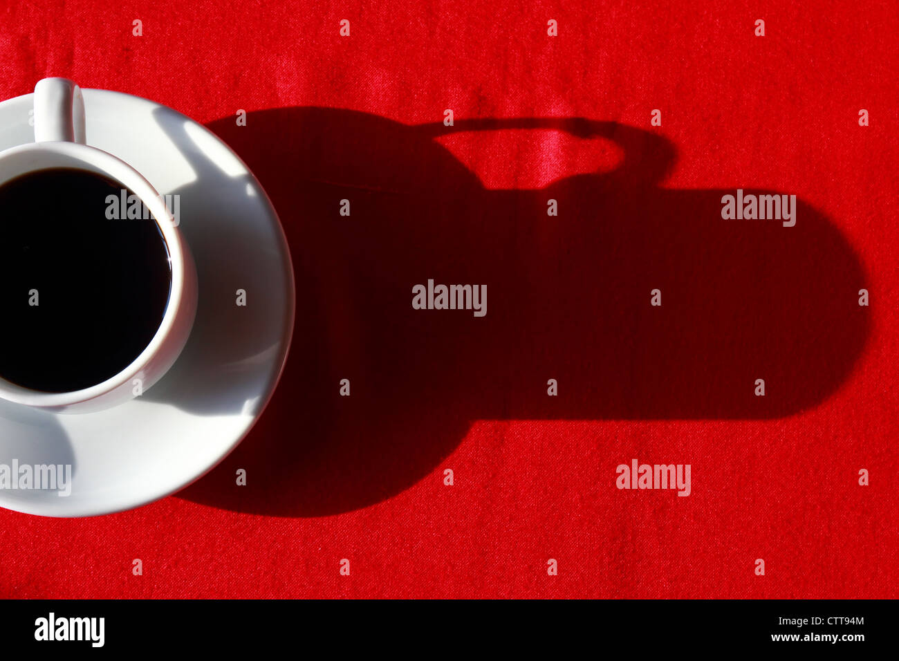 Tazza di caffè e ombra di ombra Foto Stock