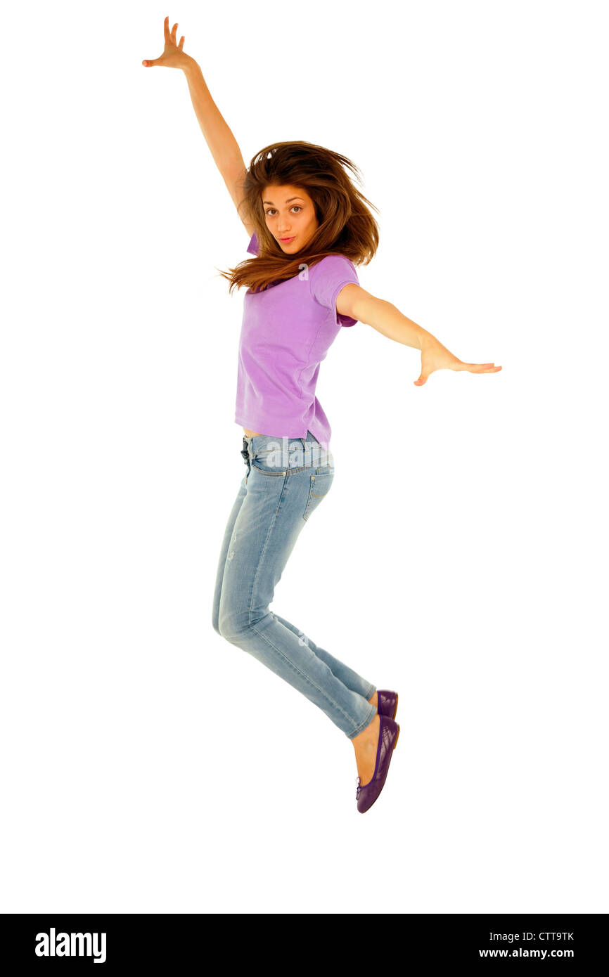 Ragazza adolescente jumping Foto Stock