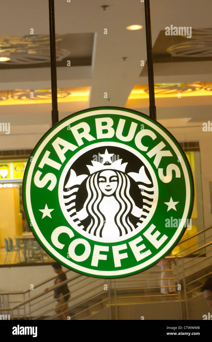 Starbucks Coffee segno, il successo di un franchising di caffè. La foto è presa a Cebu, Filippine. Foto Stock