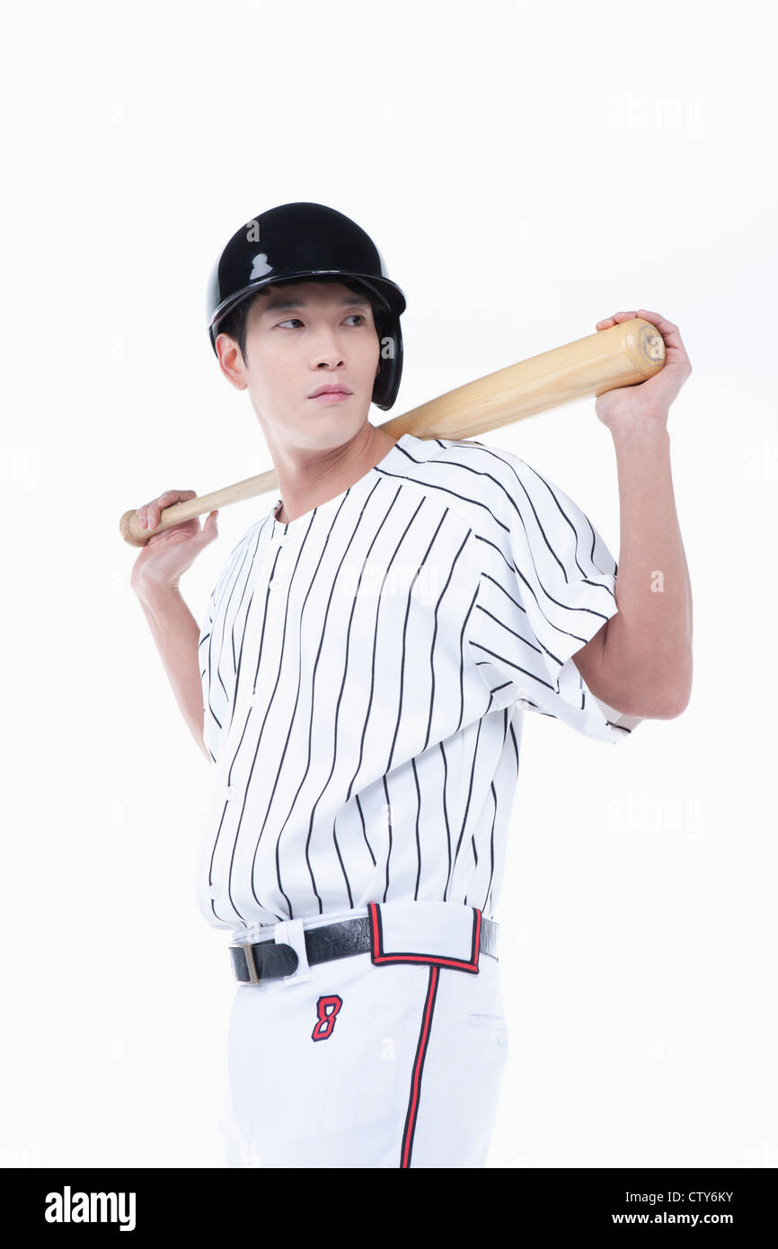 Un giocatore di baseball di mettere il bat sulla sua schiena Foto Stock