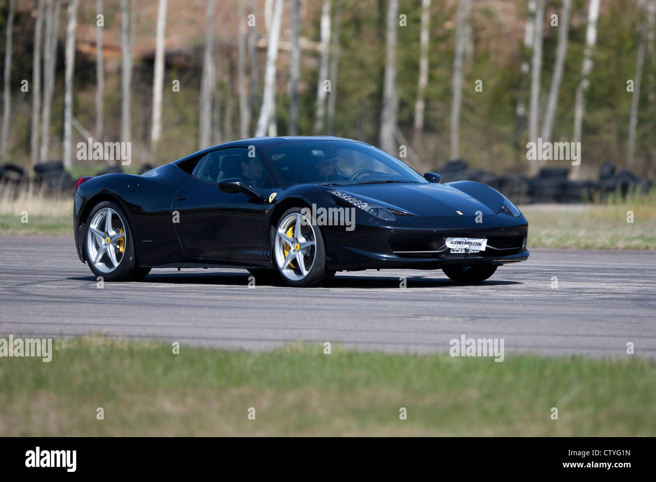 Nero Ferrari in pista Foto Stock