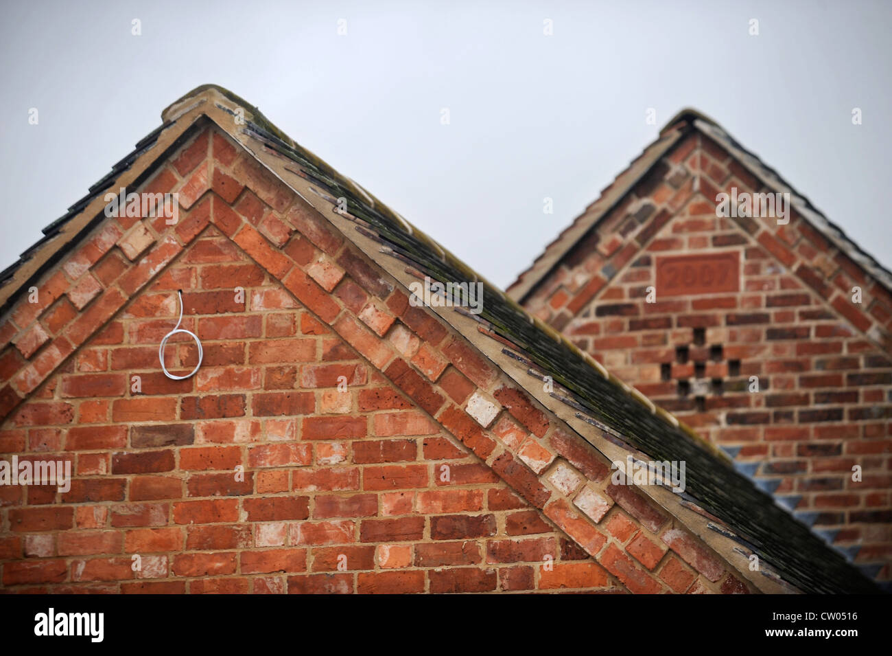 Mattone dettaglio sul timpano di un fienile conversione in corso Warwickshire, Regno Unito Foto Stock