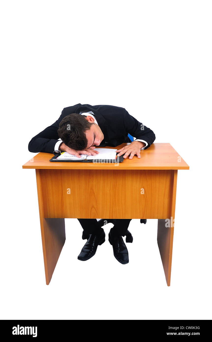 Isolate il business man a dormire la scrivania Foto Stock