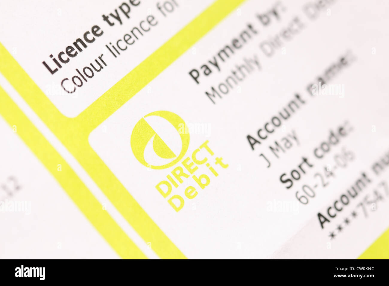 Addebito diretto simbolo del logo su una licenza TV addebito mensile conto Foto Stock