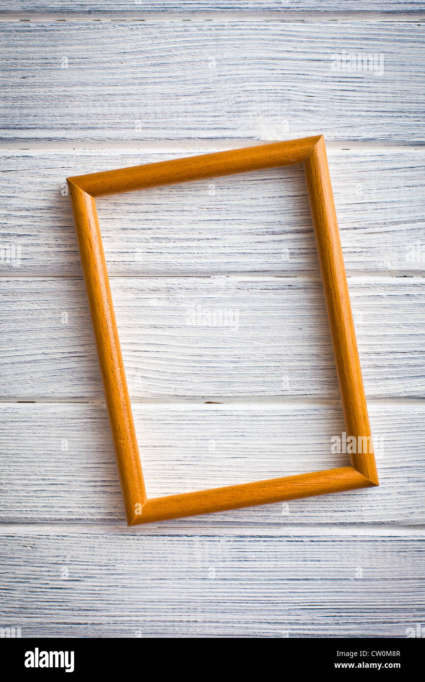 Il legno cornice immagine sul vecchio sfondo di legno Foto Stock