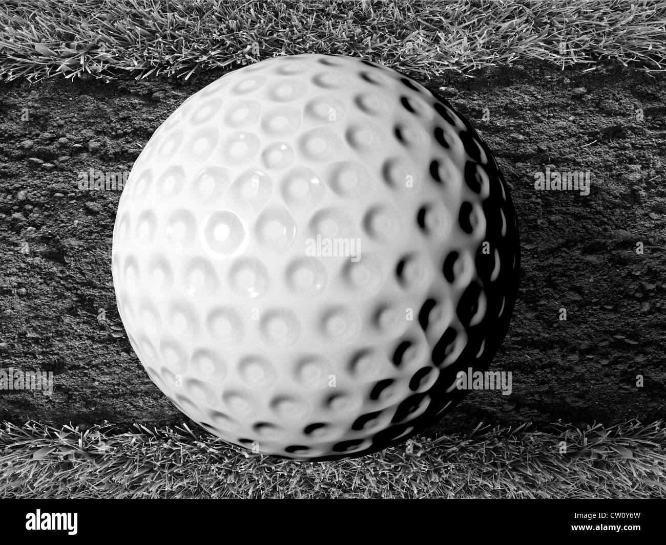 Palla da golf sul suolo Foto Stock