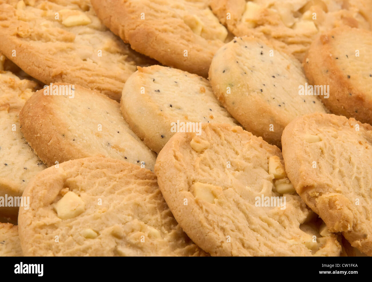 Golden di mandorle e noci macadamia cookie Foto Stock