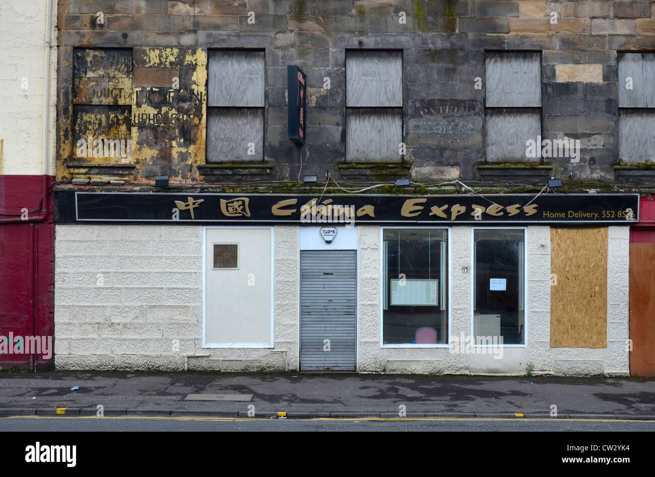 Il China Express ristorante in un piuttosto verso il basso in corrispondenza di estremità di tacco del mercante zona della città di Glasgow. Demolita Settembre 2012. Foto Stock
