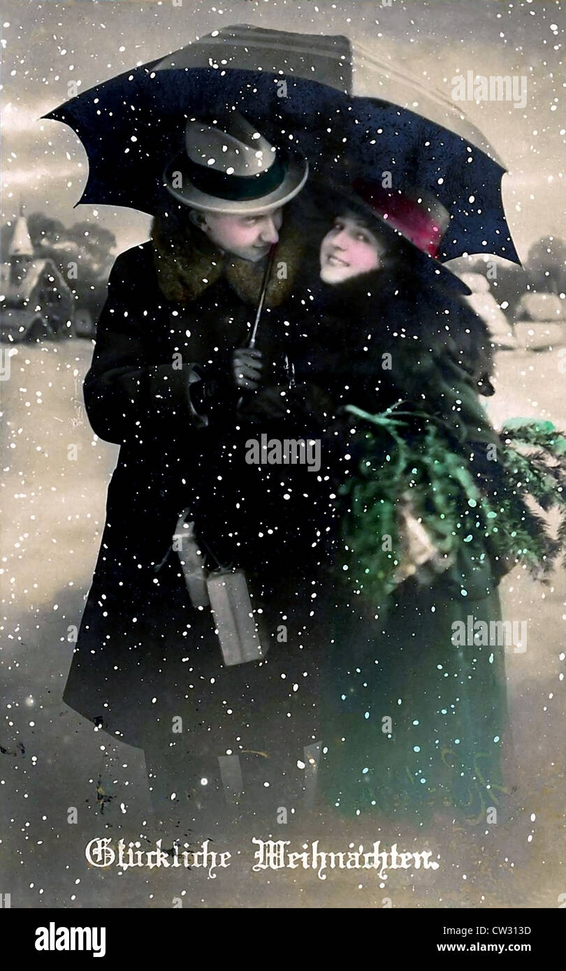 L uomo e la donna in piedi nella neve Foto Stock
