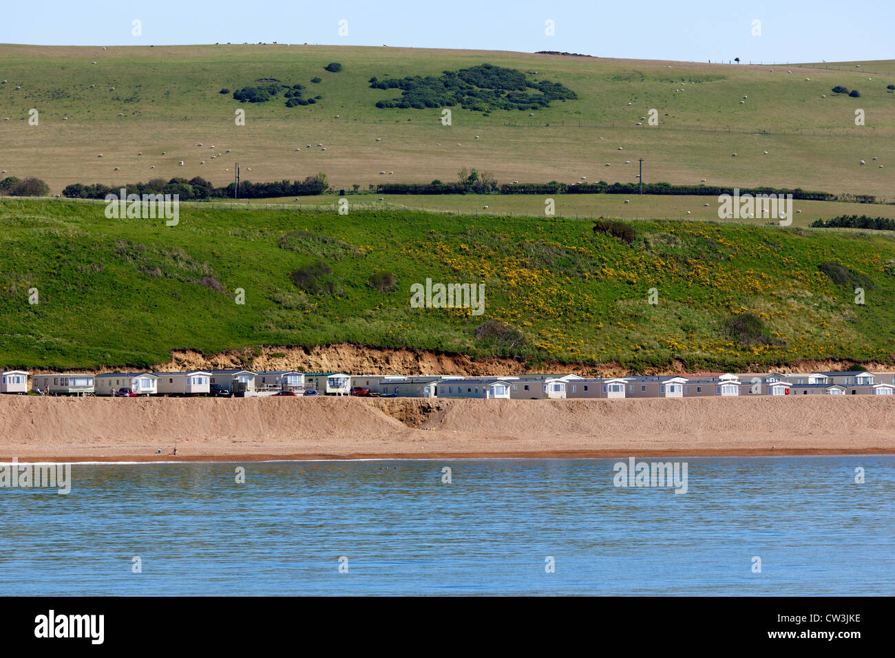 Case mobili sulla spiaggia vicino a Burton Bradstock Dorset Regno Unito Foto Stock