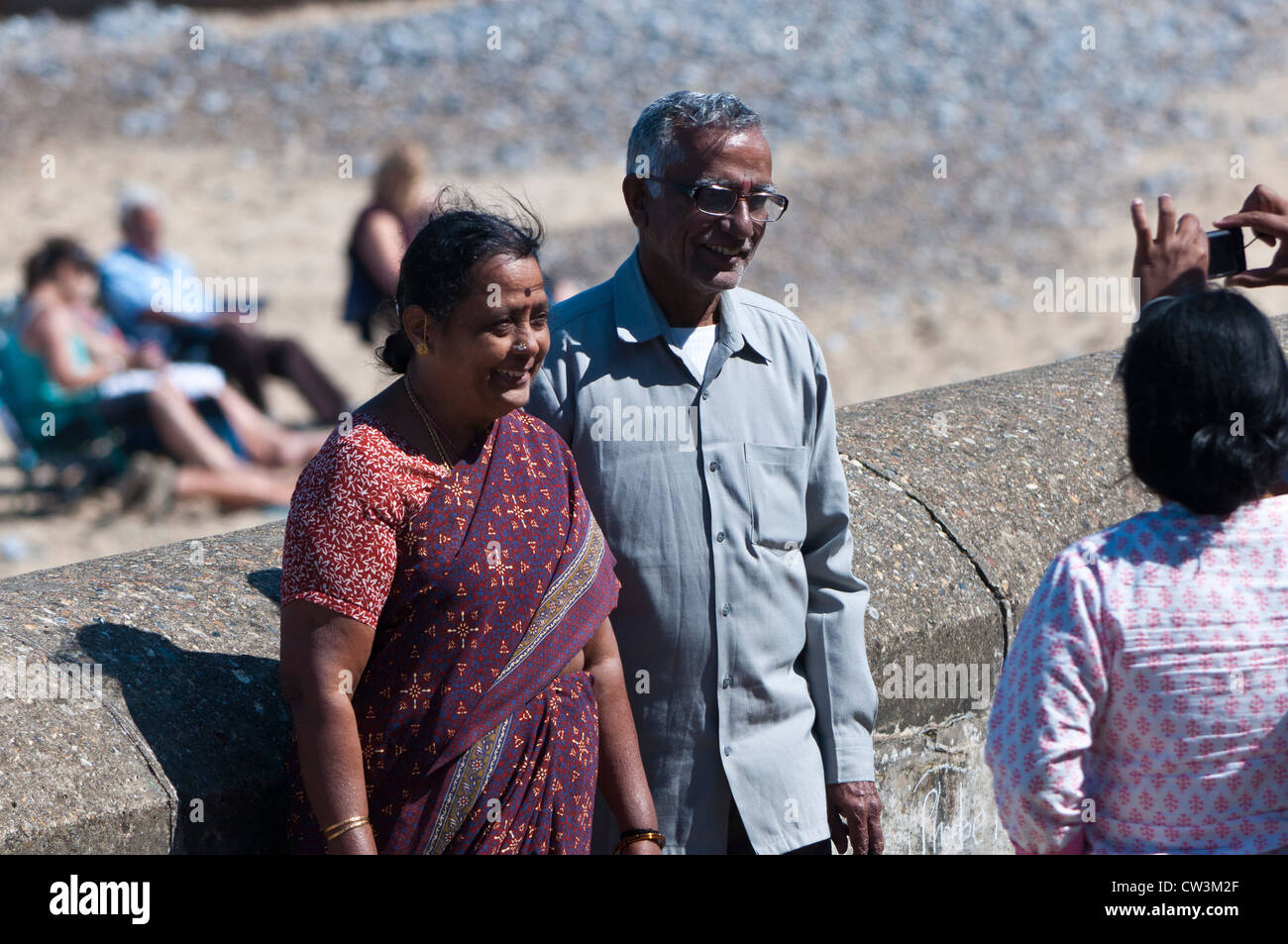 Indian famiglia asiatica in vacanza al mare Foto Stock