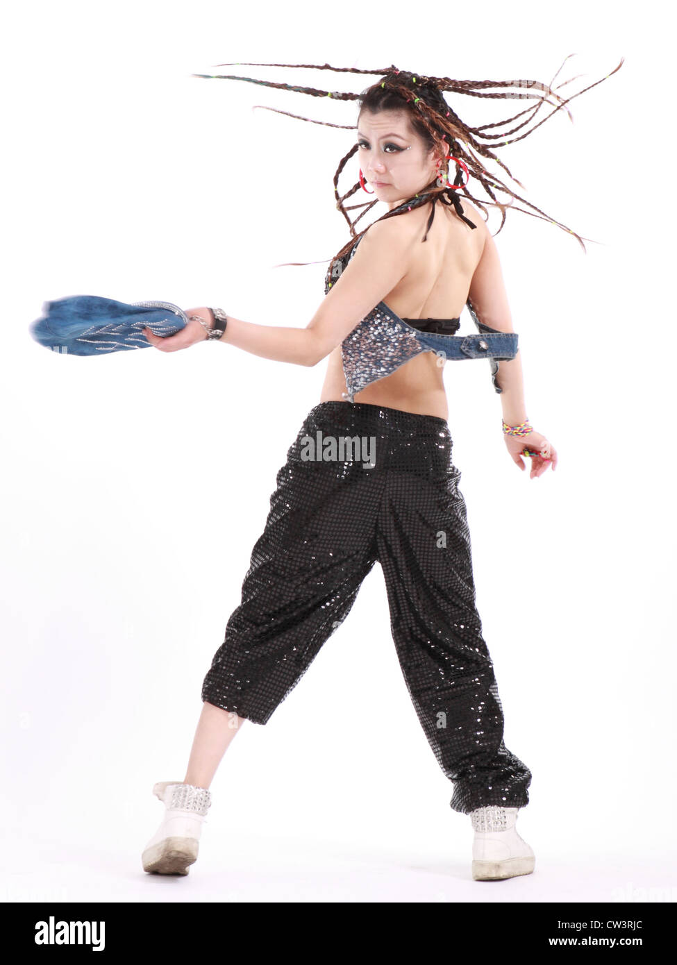 Ragazza carina in vari costumi di ballo e divertimento pone. Foto Stock