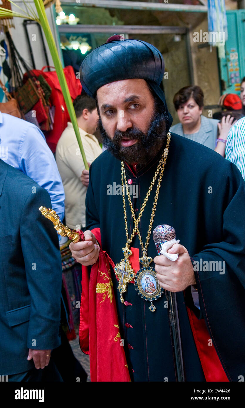 Cristiani Palestinesi prendere parte nella processione della Domenica delle Palme a Gerusalemme Foto Stock