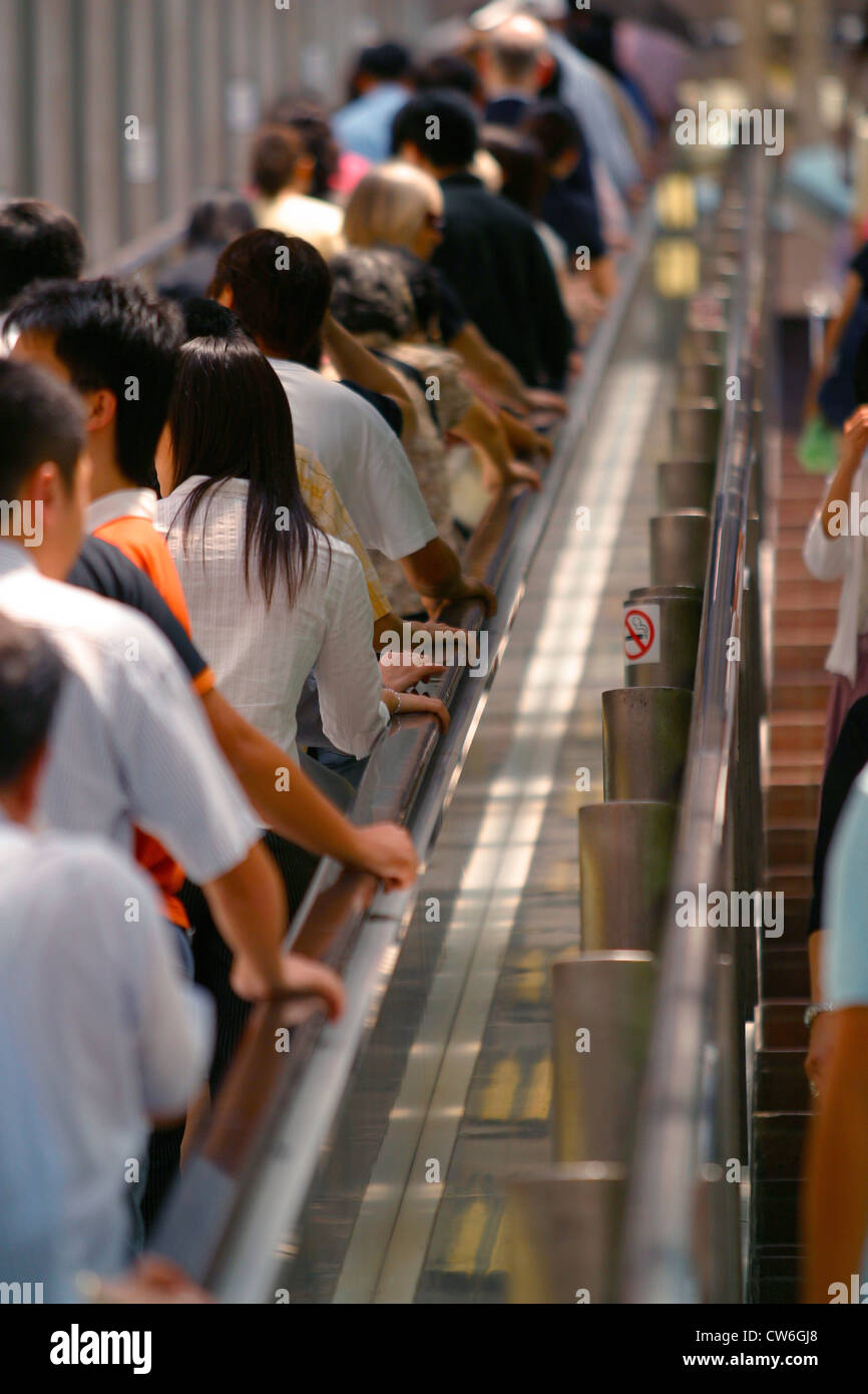 La folla di persone in Escalator in Hong Kong, Cina, Hong Kong Foto Stock