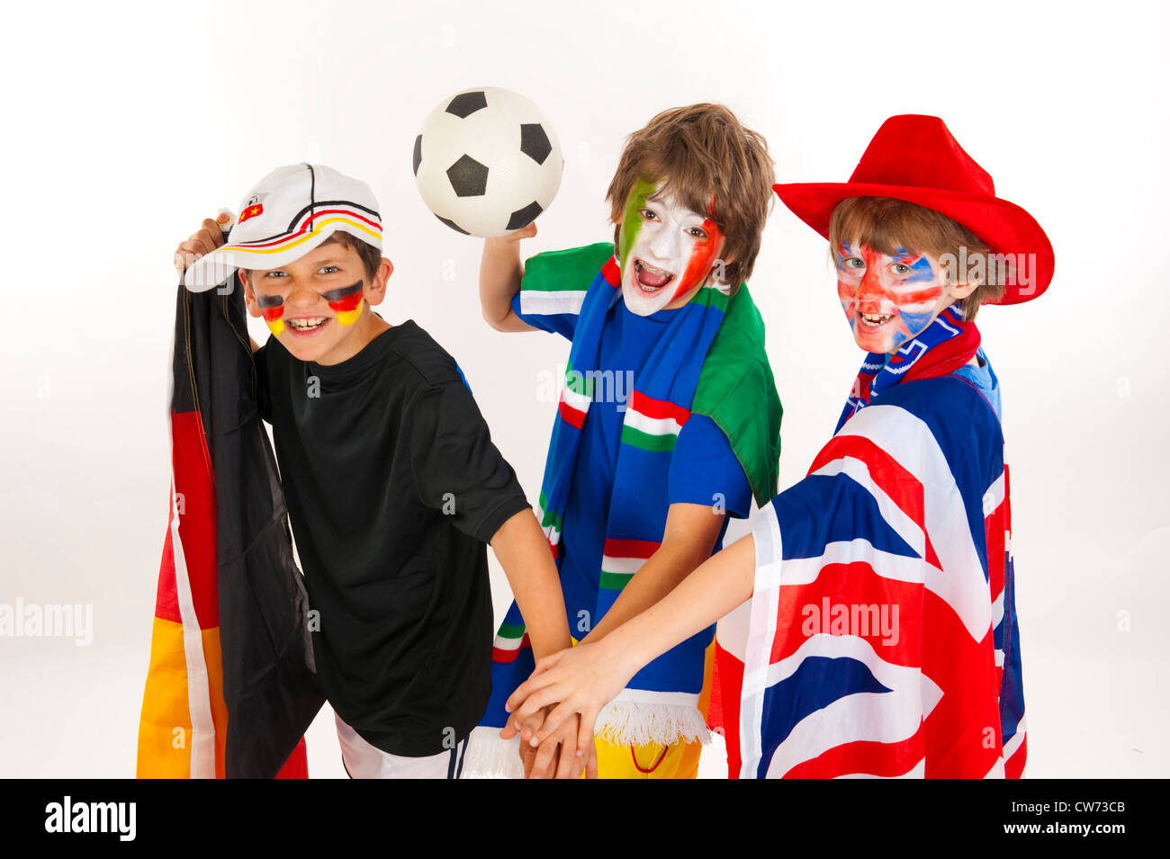 Due ragazzi come i tifosi di calcio durante il campionato del mondo 2010 Foto Stock