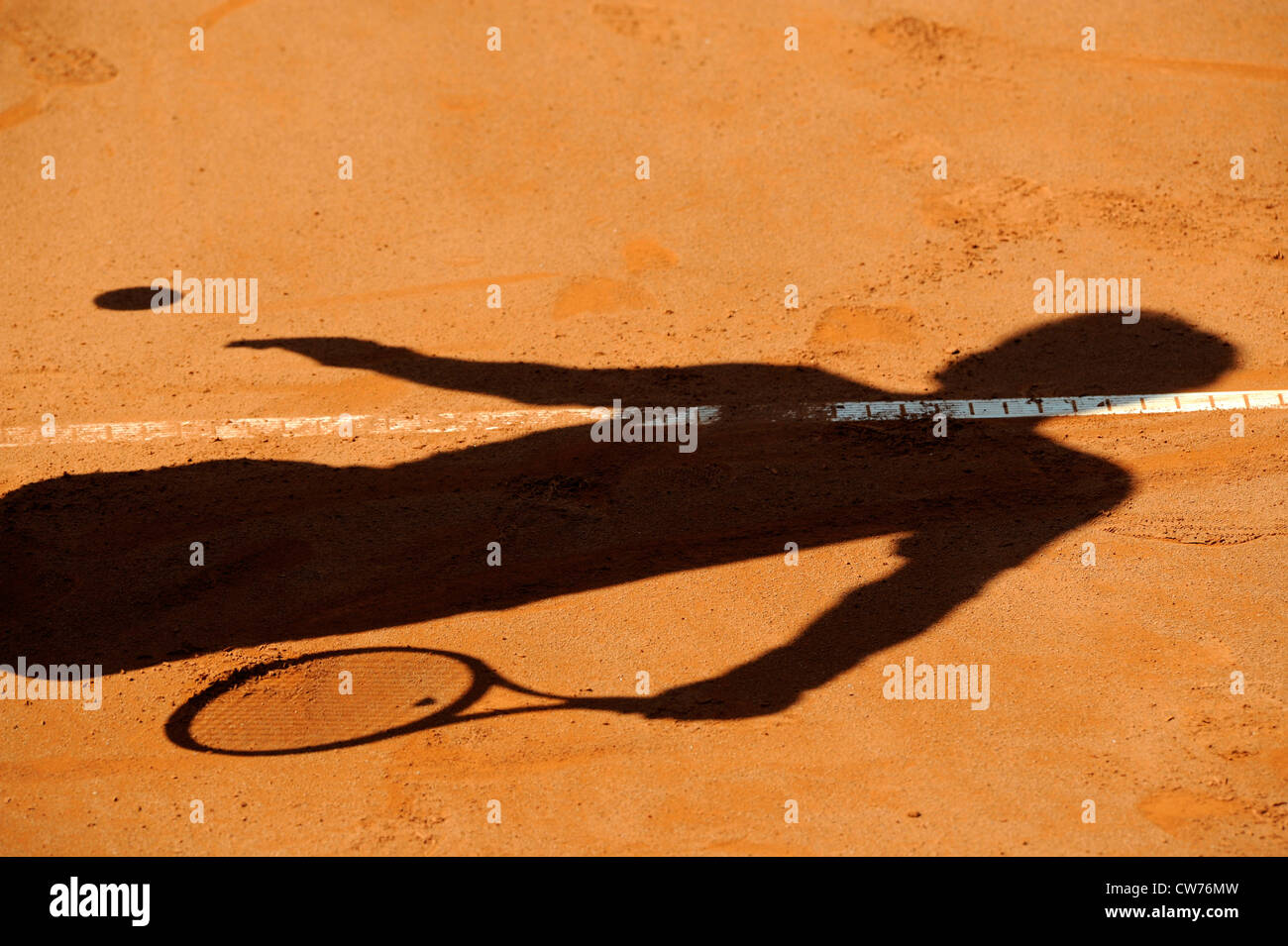 Ombra di un giocatore di tennis Foto Stock