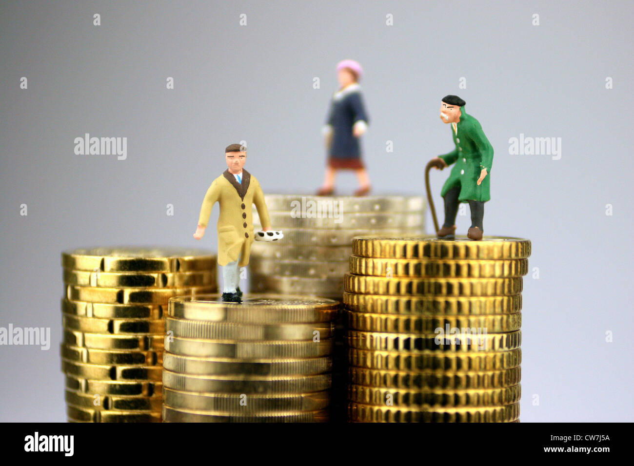 Poco figure sulle monete Foto Stock