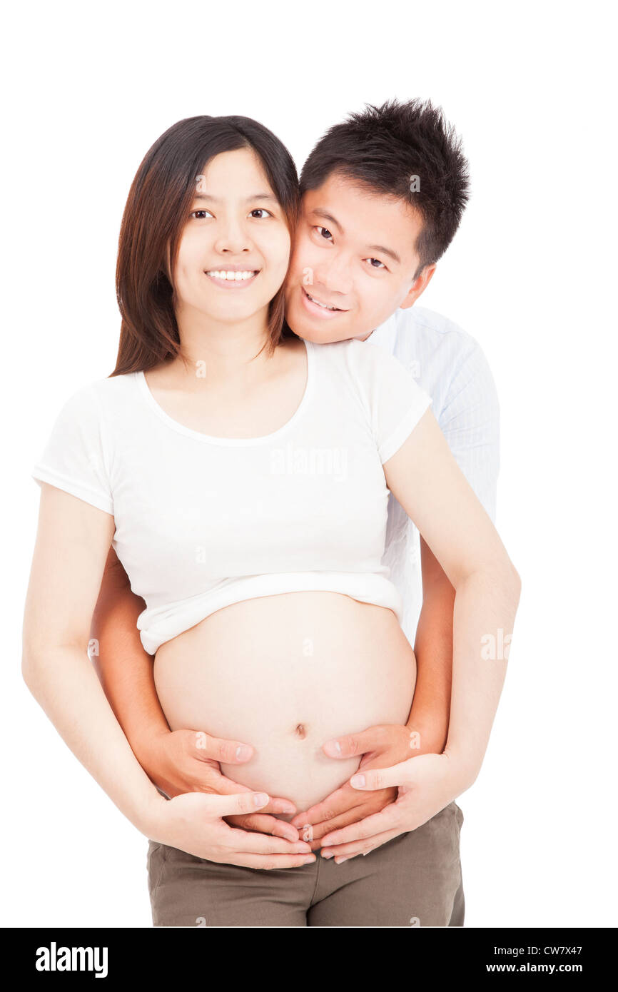 Asian Le donne in stato di gravidanza con il marito isolato su bianco Foto Stock