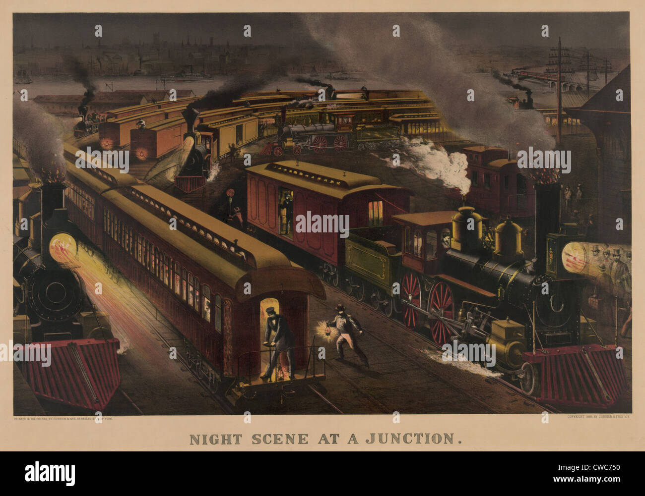 Giunzione della ferrovia nel 1885. Treni passeggeri e merci in arrivo e in uscita di un American multi-via stazione ferroviaria di notte. Foto Stock