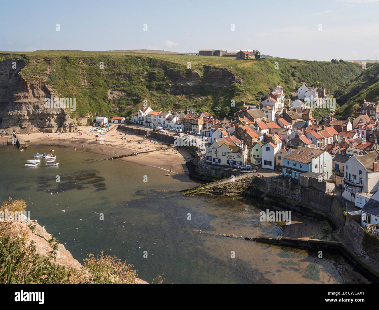Staithes villaggio ed un porto da Cowbar Nab. North Yorkshire Regno Unito Foto Stock