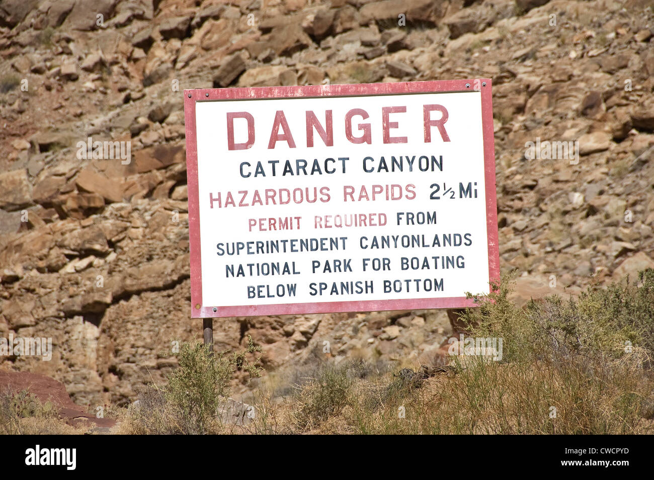 Elk289-1482 Arizona, Canyonlands National Park, Green River canoa, giorno 7, cataratta Canyon segno di avvertimento Foto Stock