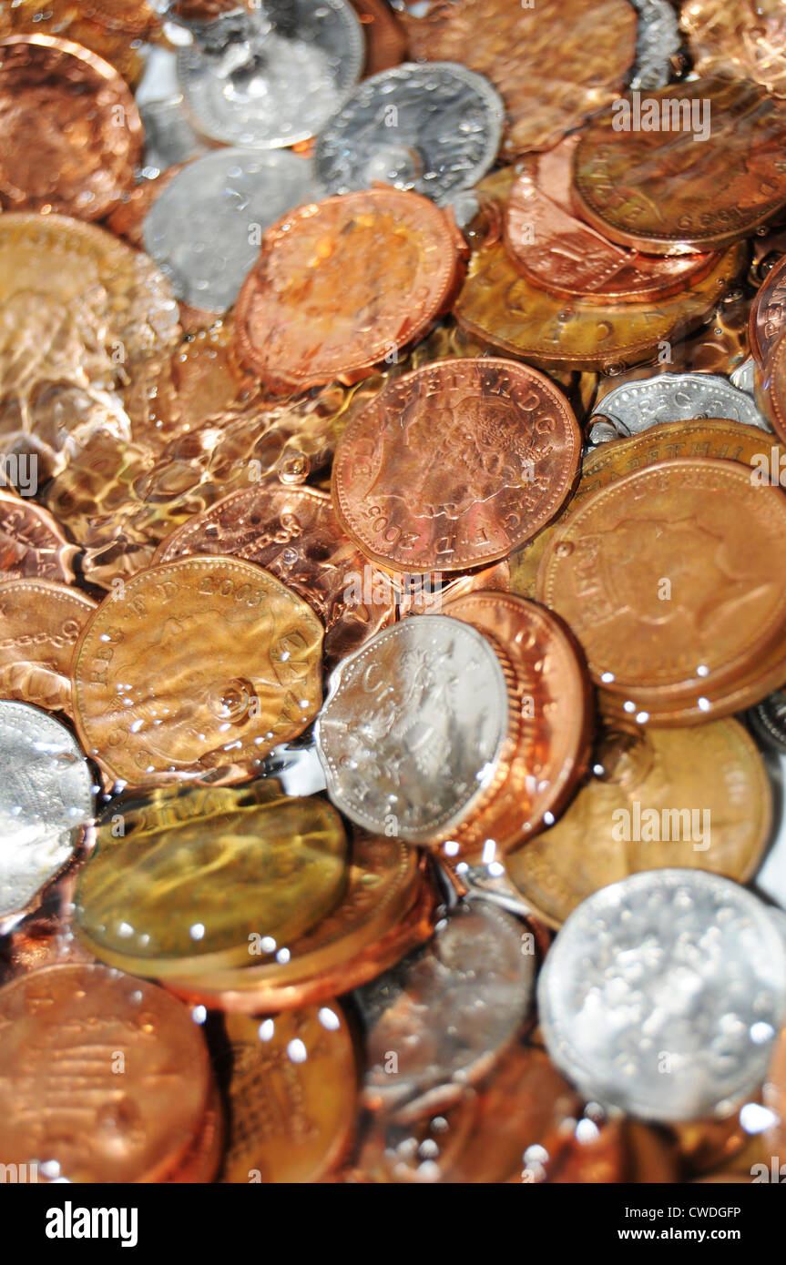 Abstract monete sfondo (denaro per lavanderia o denaro metafora della molla) Foto Stock