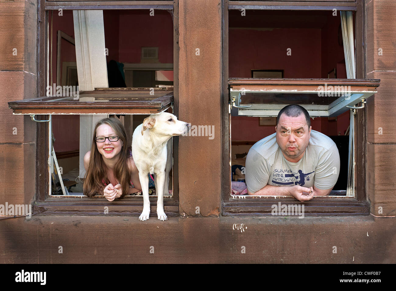 Tradizionale di pietra arenaria rossa tenement, Howat Street, Govan, Glasgow, Scozia Foto Stock