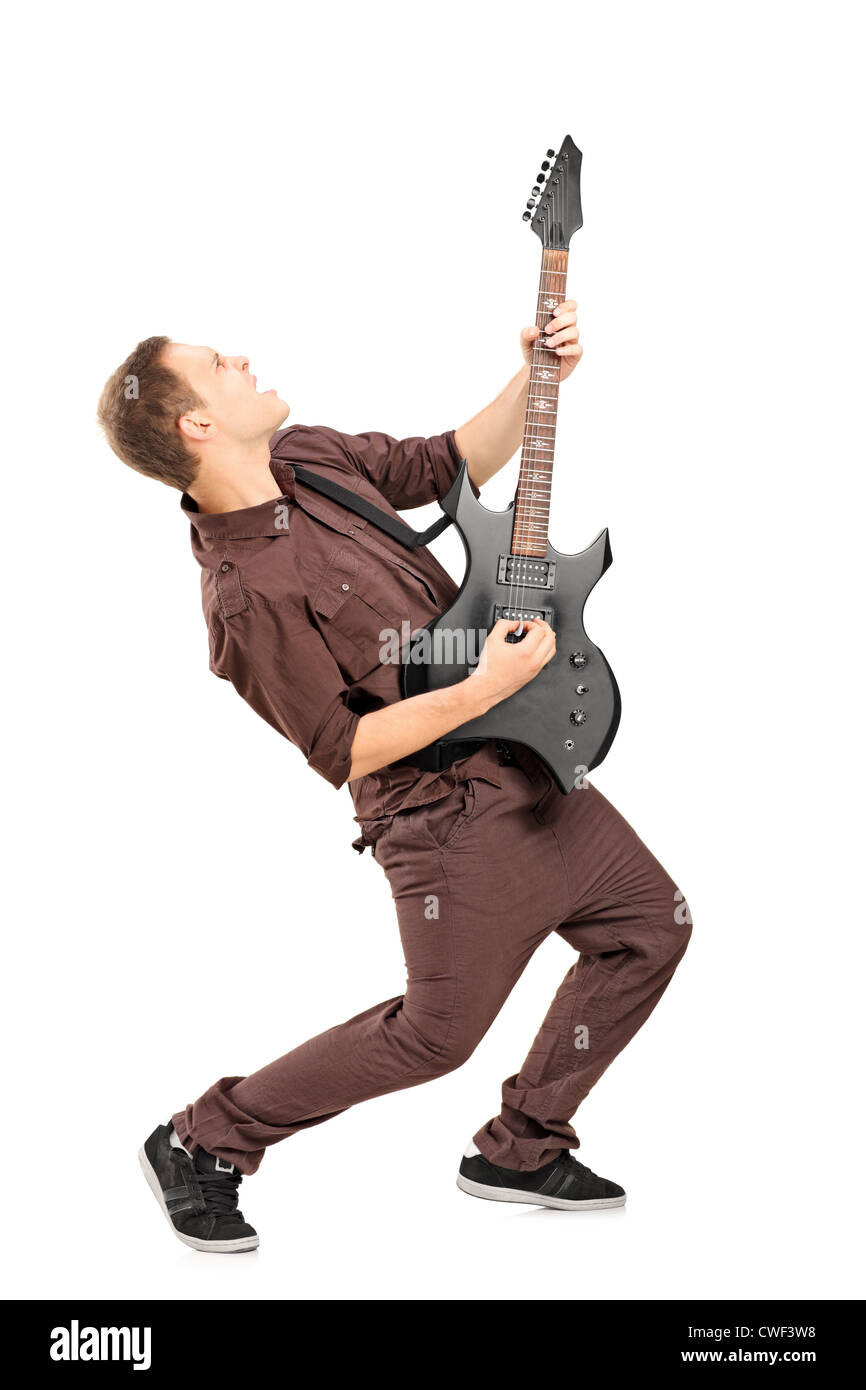 A piena lunghezza Ritratto di una star del rock suonando la chitarra isolato su bianco Foto Stock