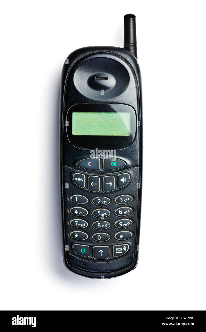Il vecchio telefono cellulare su sfondo bianco Foto Stock