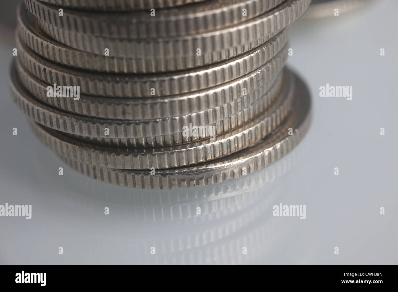 Pile di monete di denaro Foto Stock