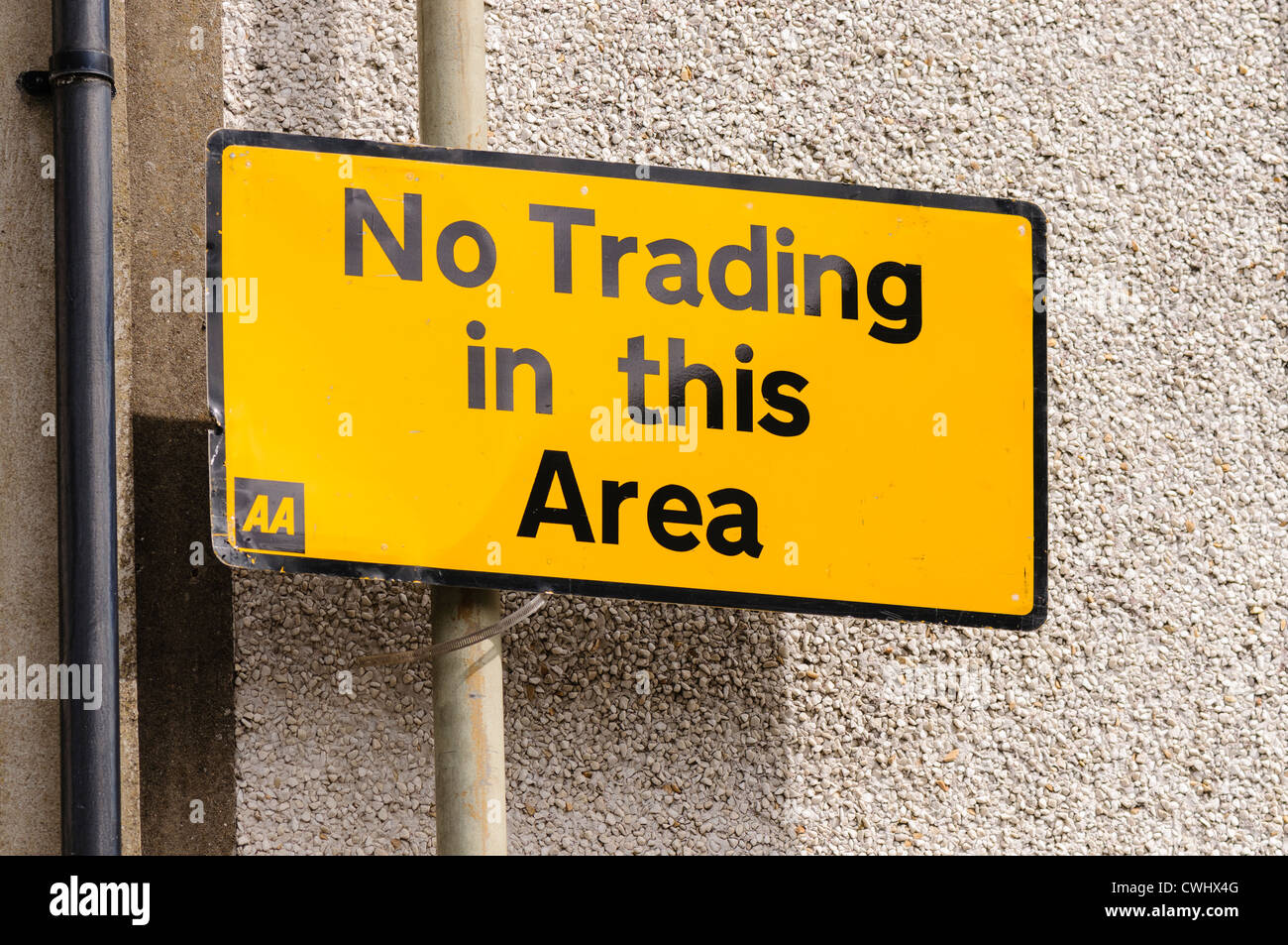 AA strada segno avvertimento contro il commercio in questa zona Foto Stock