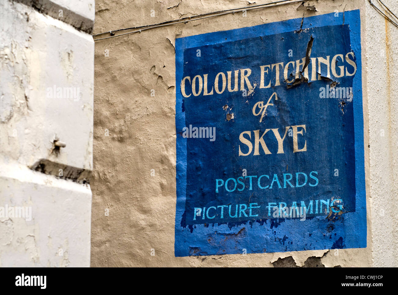 Segno dipinto sul fianco di un negozio a Portree, Isola di Skye, Scotland, Regno Unito Foto Stock