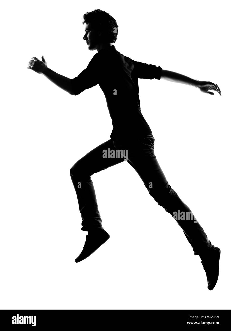 Giovane uomo correre silhouette in studio isolato su sfondo bianco Foto Stock