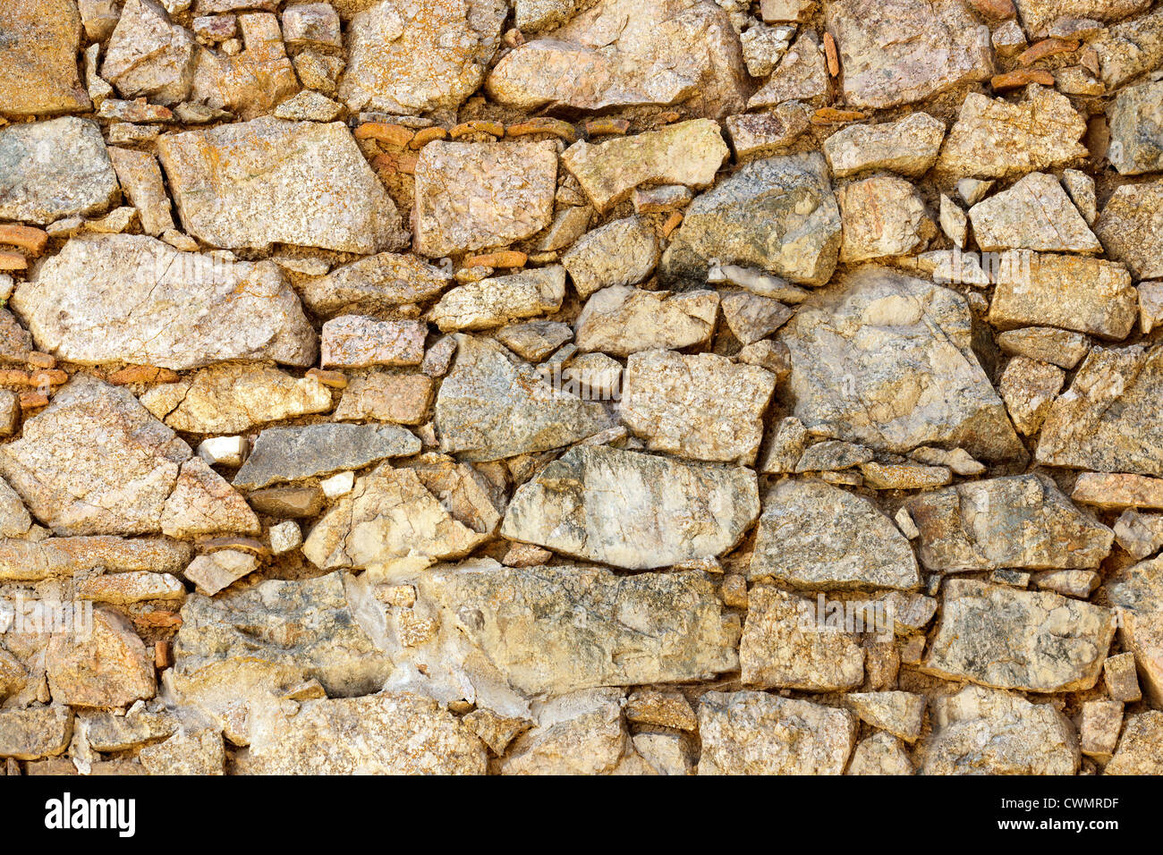 Antica pietra parete tradizionale nel paese Foto Stock