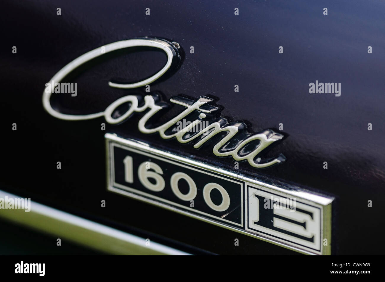 Badge sulla parte posteriore di una Ford Cortina Mk2 1600E (1968-1970) Foto Stock