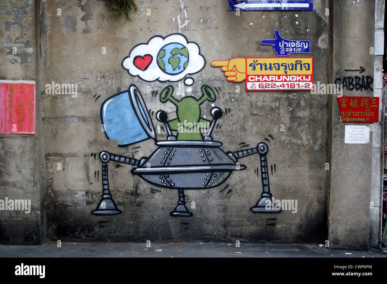UFO graffiti sul muro in Bangkok Chinatown , della Thailandia Foto Stock